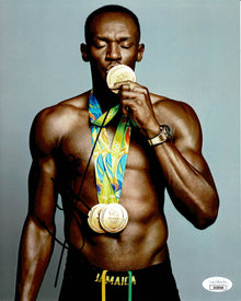  Usain Bolt Signed 10X8 PHOTO Olympics JAMAICA Genuine Signature AK29349 JSA COA