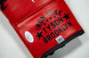 Mike Tyson Autographed Boxing Glove – JSA AK28192 COA & Proof Photo