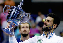  Novak Djokovic Signed 12X8 PHOTO Genuine Signature 24th Grand Slam AFTAL COA (E)