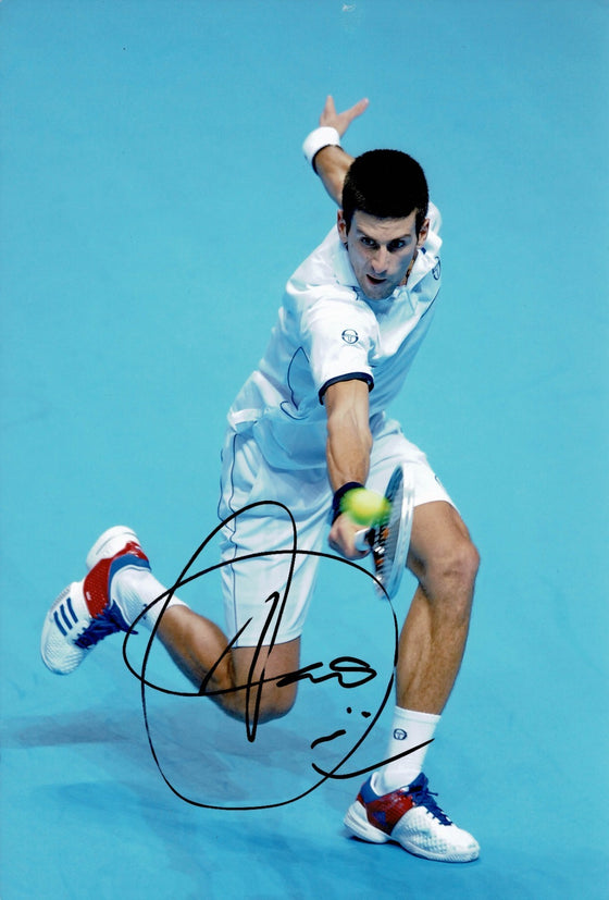 Novak Djokovic Signed 12X8 PHOTO Genuine Autograph AFTAL COA (D)
